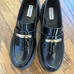 Steve Madden Glossy Black Loafers with Gold Accent